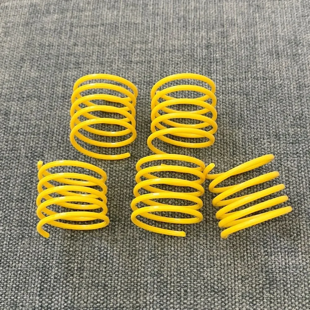 5 Gently Used Yellow Cat Spring Toys